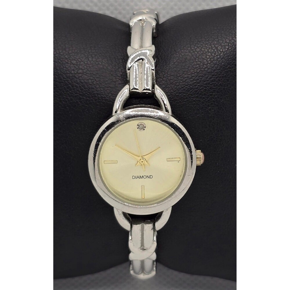 Women's Classic Dress Diamond Round Champagne Dial Silver Tone Bangle Watch 04